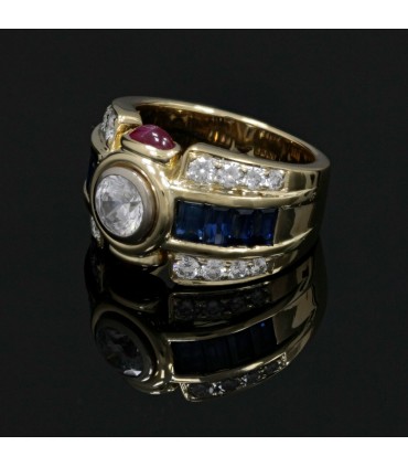 Diamonds, sapphires, rubies, white stone and gold ring