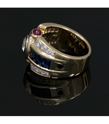 Diamonds, sapphires, rubies, white stone and gold ring