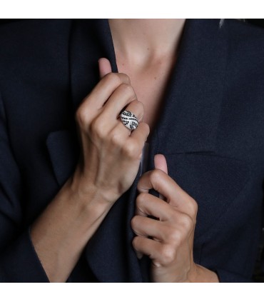 Black, white diamonds and gold ring