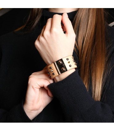 Louis Vuitton laether and gold plated bracelet