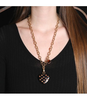 Diamonds, citrines, onyx and gold necklace