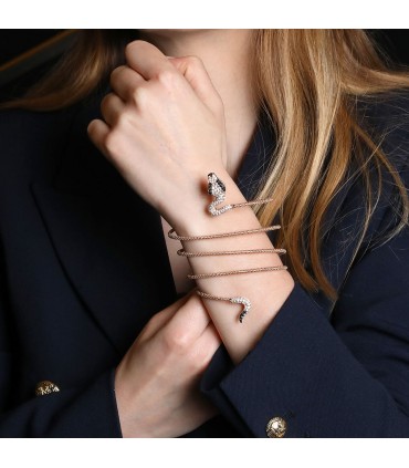 Black and white diamonds, emeralds and gold bracelet