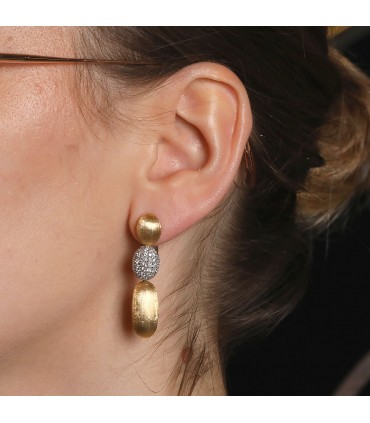 Nanis diamonds and gold earrings