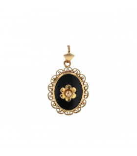 Gold and onyx pendant