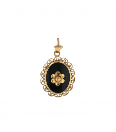 Gold and onyx pendant