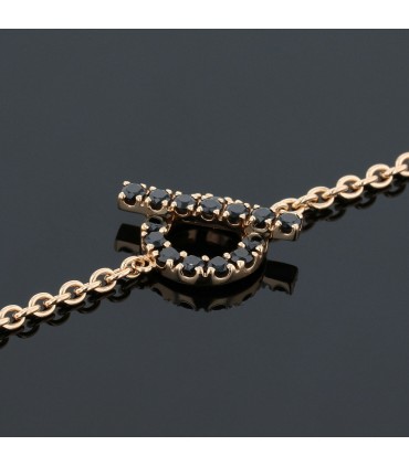 Hermès Finesse black spinels and gold bracelet