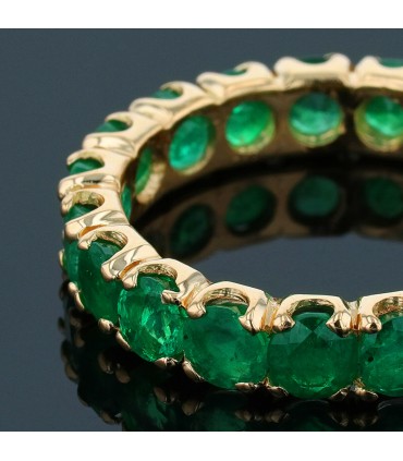 Emeralds and gold ring