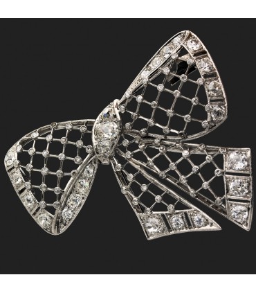 Broche noeud platine et diamants