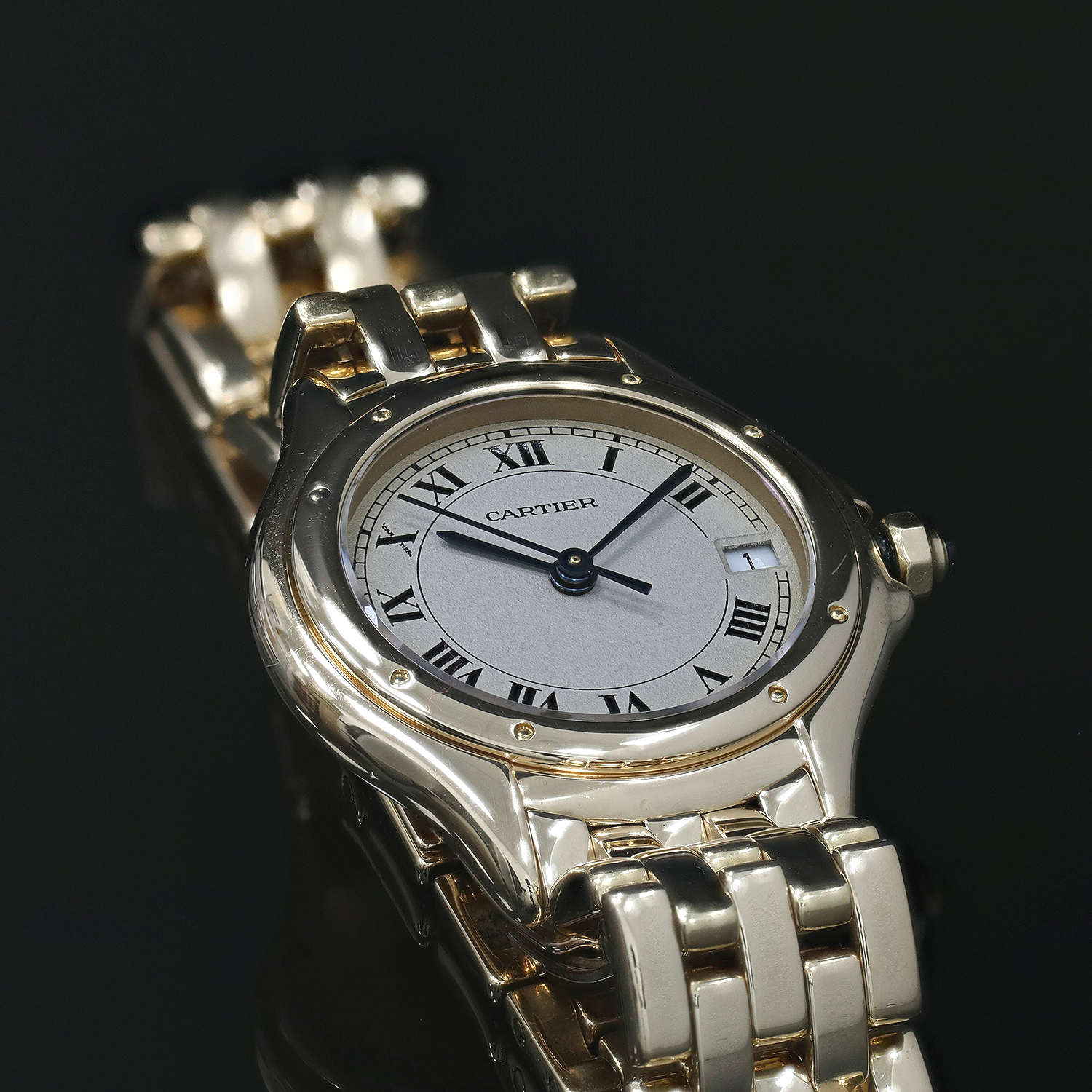 Cartier Cougar gold watch